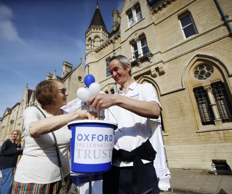 lady giving a donation