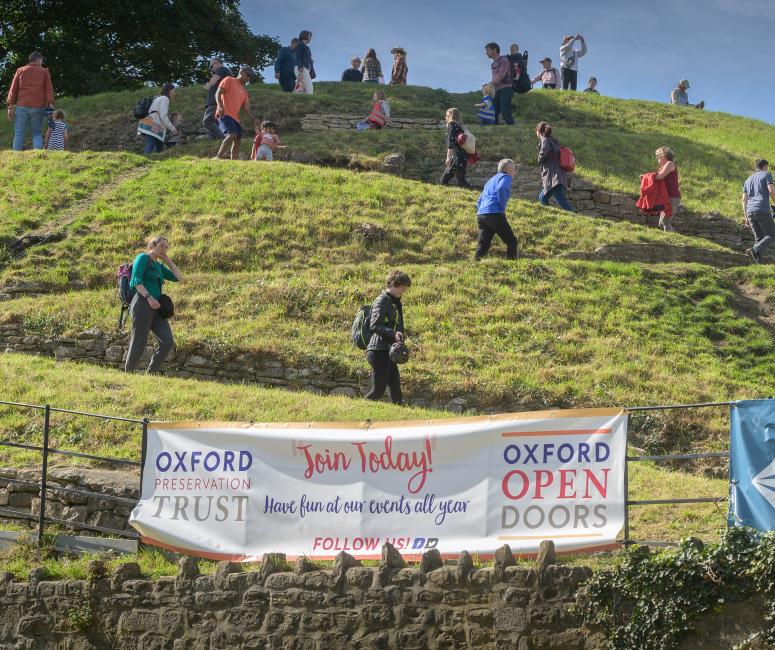 The Castle mound being climbed by lots of visitors at Oxford Open Doors 