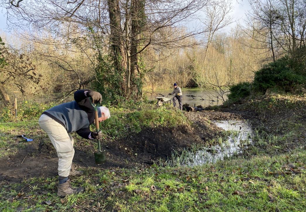 Volunteers starting to increase the size of the backwater